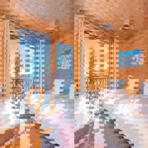 Family room with balcony in the Chalet-Hotel Lucille 