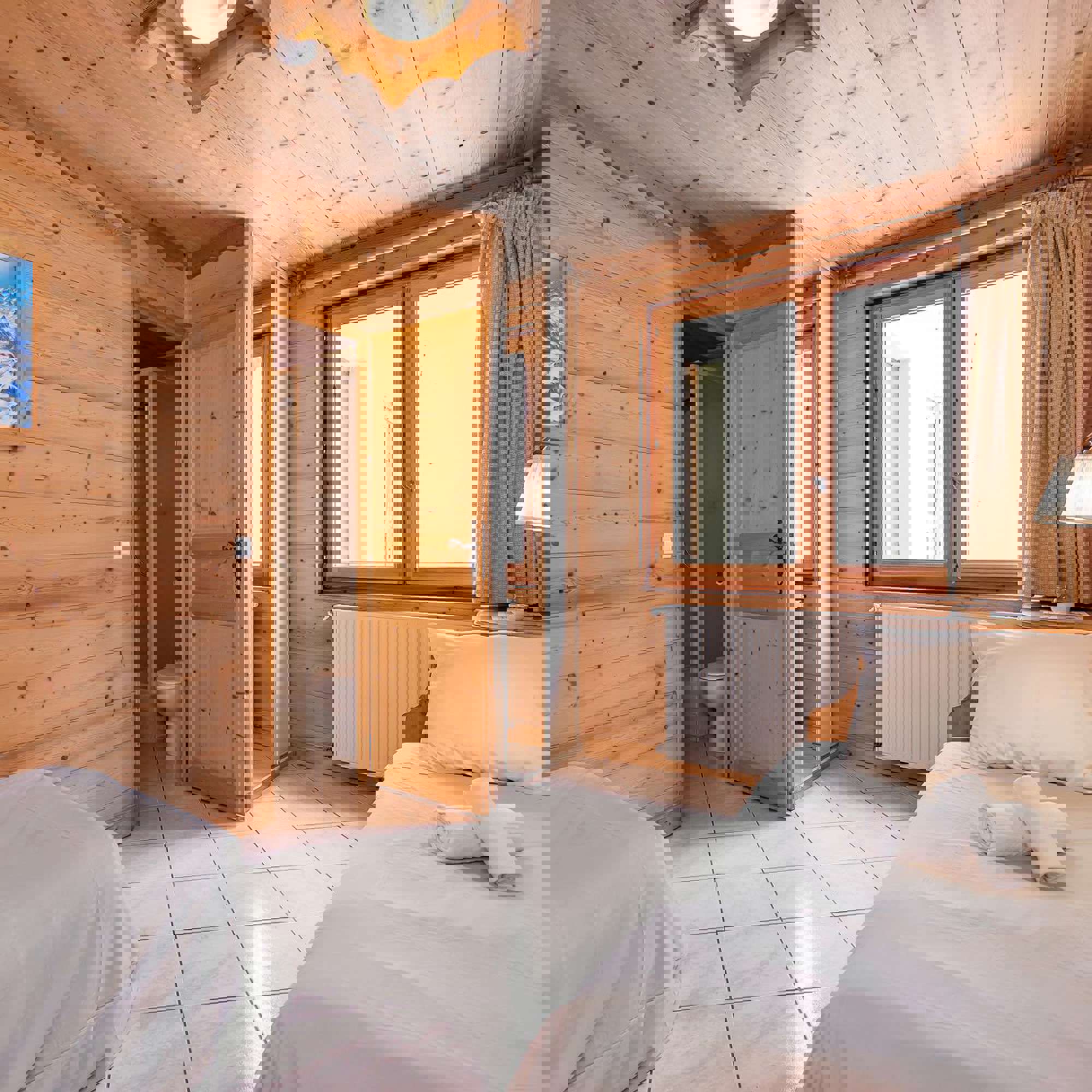 Twin room in the Chalet-Hotel Lucille 